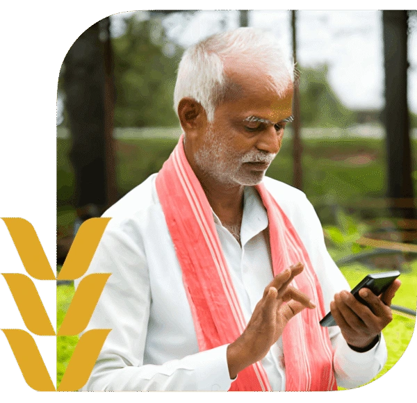 Indian farmer accessing digital agriculture tools and weather-based insurance through a mobile app in a rural field